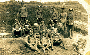Gas mask drill for members of the New Zealand Engineers Tunnelling Company. Bottom right is Sergeant George Edward Hatch, a miner from Hokitika, who was awarded the DCM for; “Conspicuous gallantry and devotion to duty, and consistent good work over a lengthy period. When it was necessary for the safety of the line that machine gun positions should be completed at once, he personally got out in the open and worked under shellfire during the whole night. By his untiring energy and disregard of his personal safety he set a fine example to his men.”