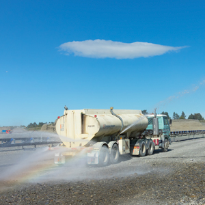The 22,000 litre watercart in action alongside a section of the 700 metre field conveyor.